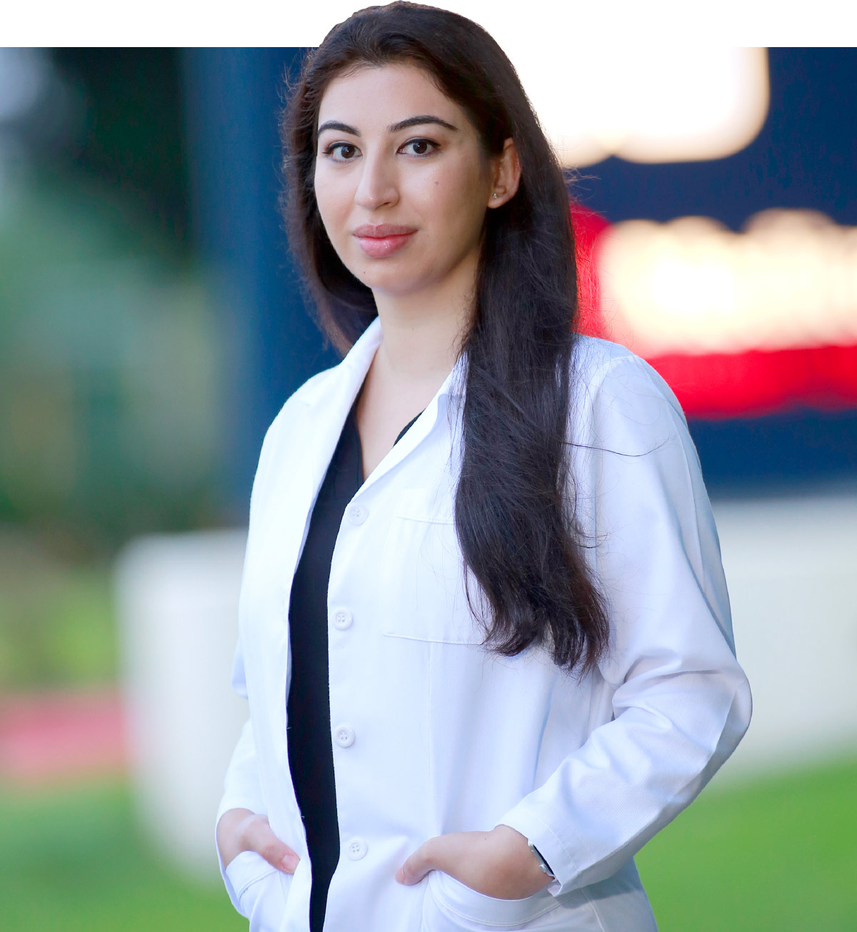 Suha Alsalihi in her white coat