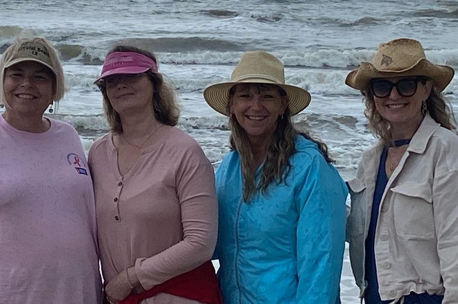 Group of ladies in front of the ocean