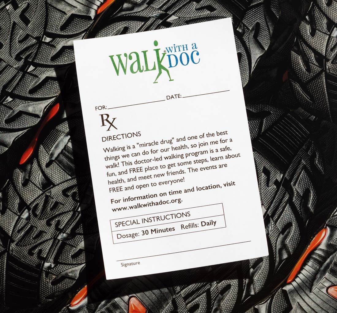 "Walk With a Doc" prescription note on top of running shoes