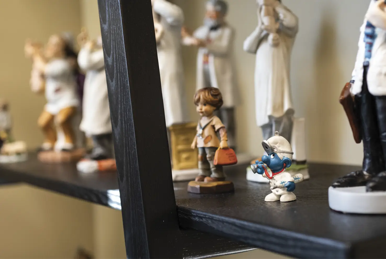 Group of assorted figurines on shelf